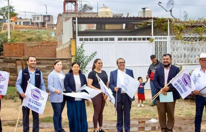 banderodarte Construcción de viviendas en Chihuahua, programa de desarrollo social, comunidad beneficiada, inauguración de infraestructura, Ayuntamiento y vecinos en evento comunitario.